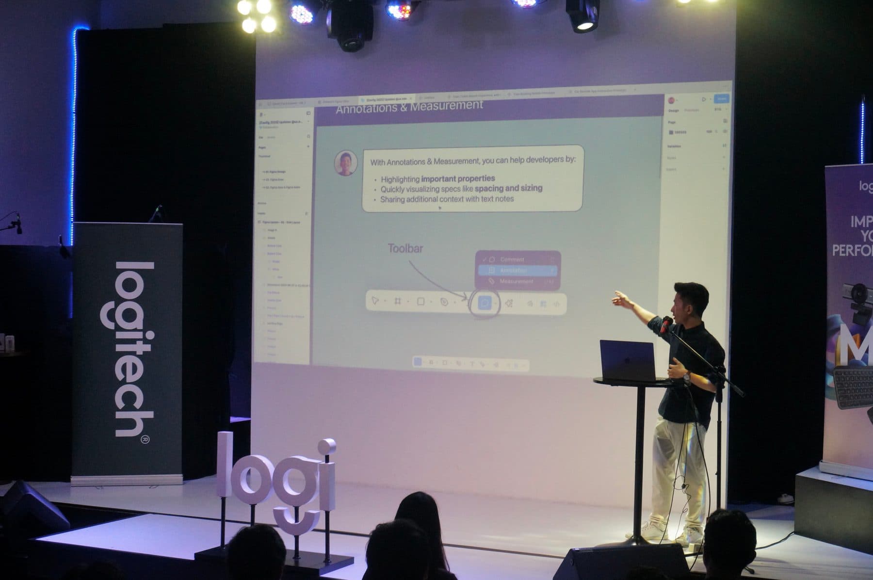 Edward presenting on stage at a Logitech event