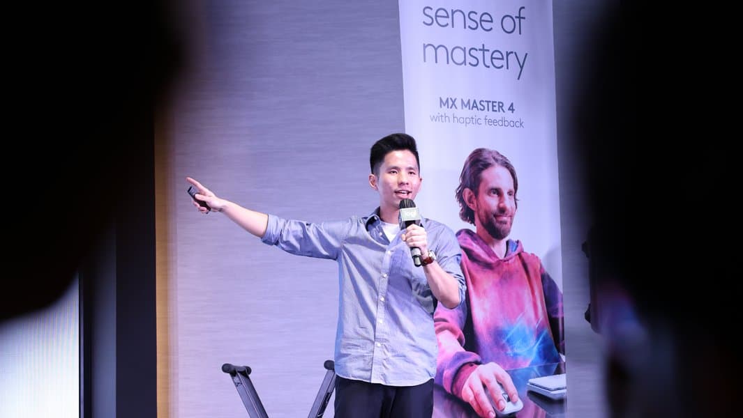 Edward speaking on stage at a Logitech MX Master event